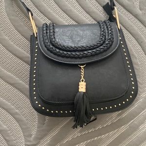 Black crossbody bag with fringe
